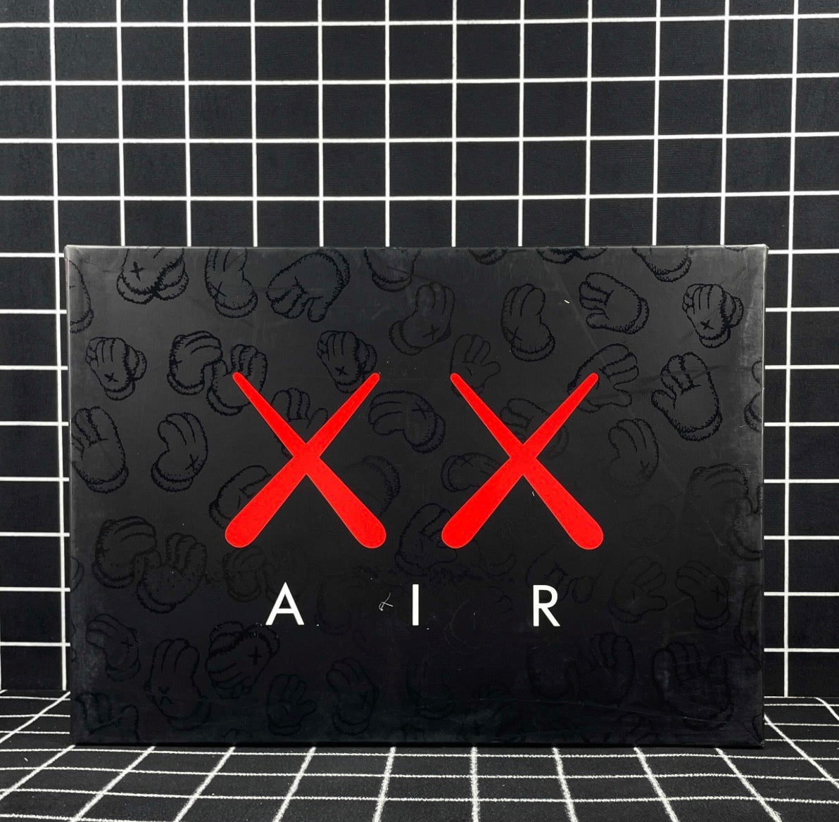 Air Jordan 4 Retro x KAWS “Cool Grey” (Premium)