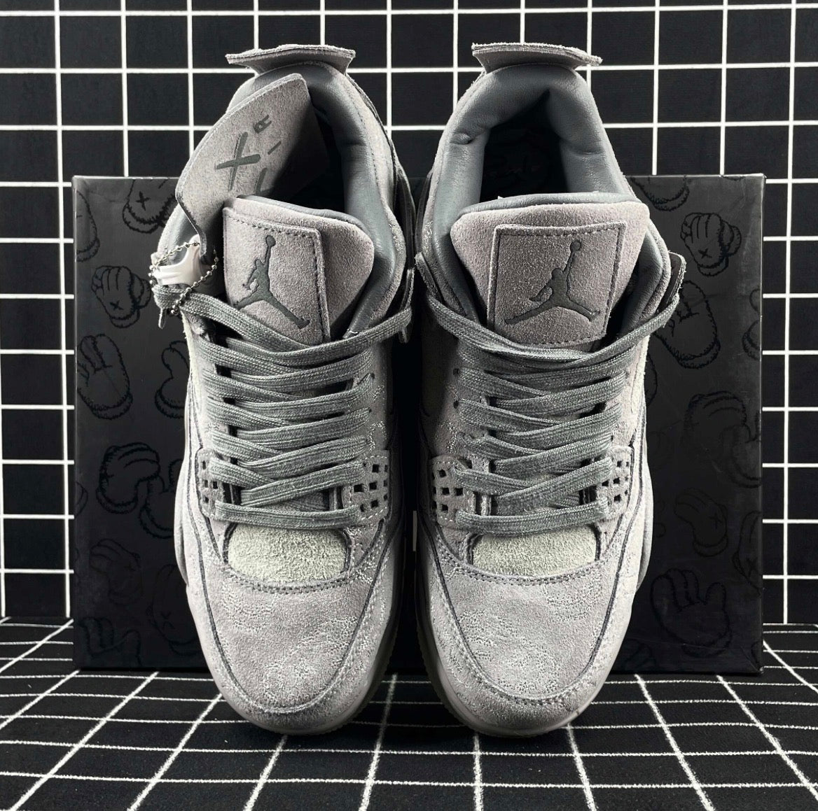 Air Jordan 4 Retro x KAWS “Cool Grey” (Premium)