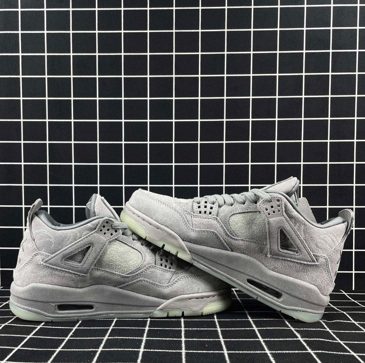 Air Jordan 4 Retro x KAWS “Cool Grey” (Premium)
