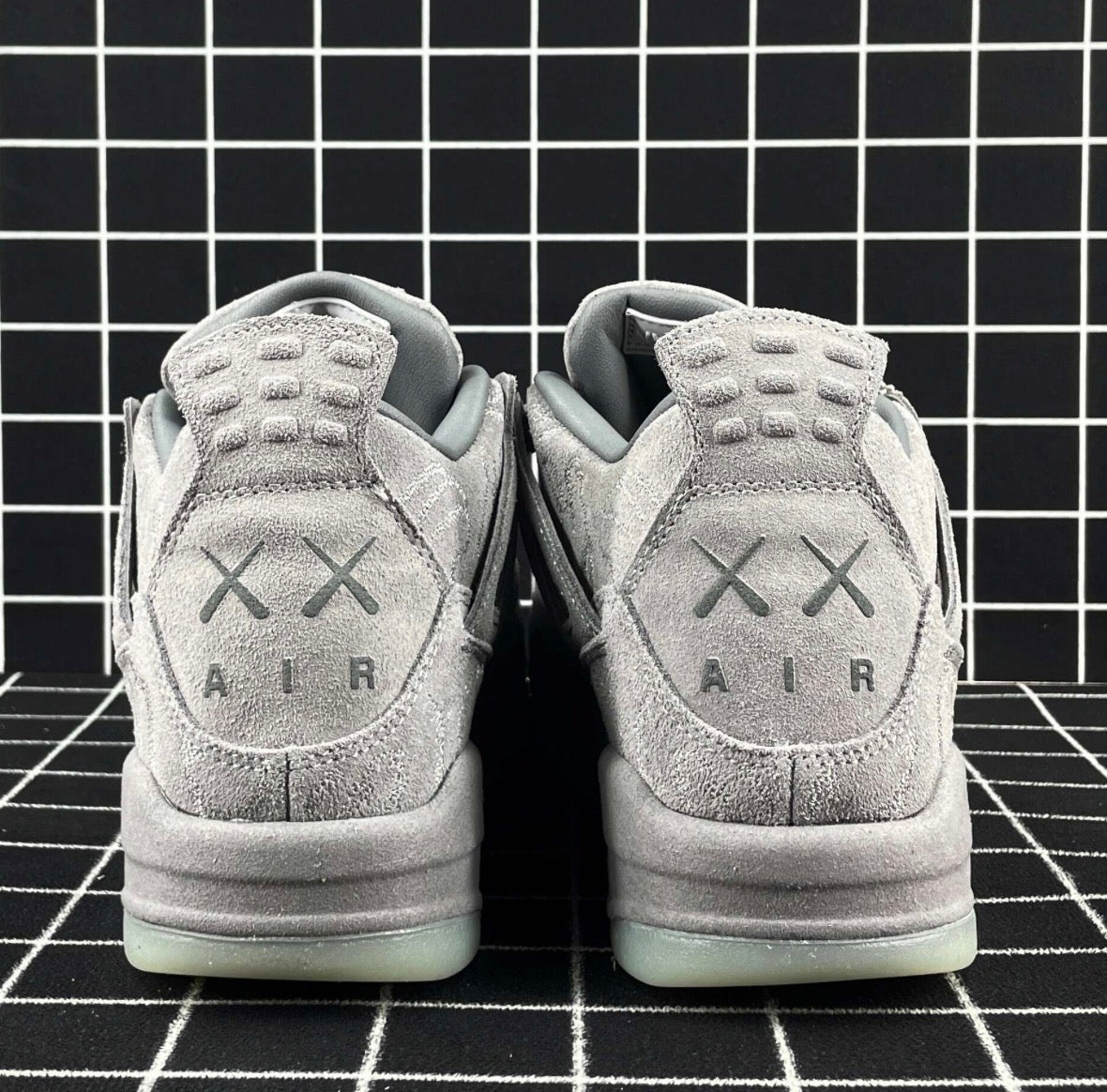 Air Jordan 4 Retro x KAWS “Cool Grey” (Premium)