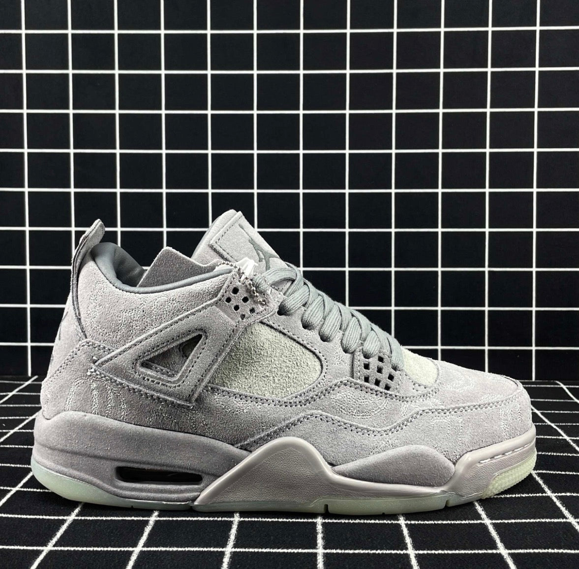 Air Jordan 4 Retro x KAWS “Cool Grey” (Premium)