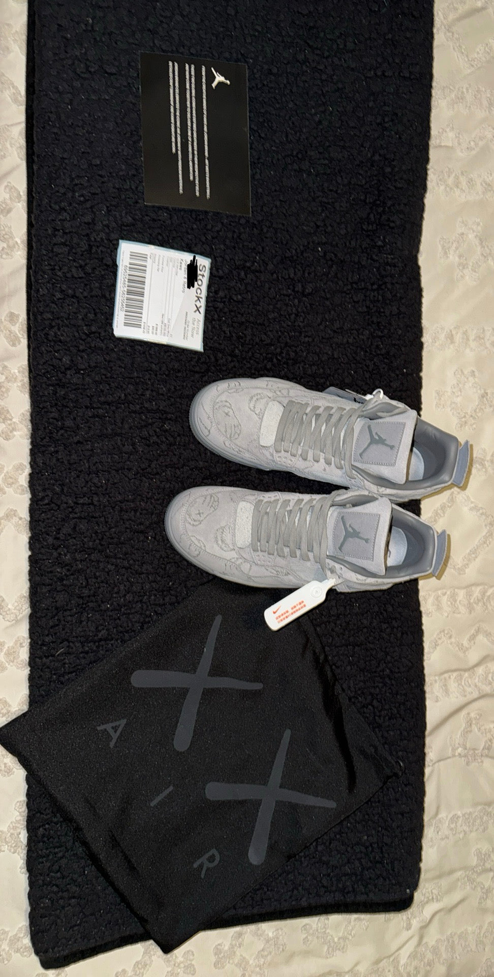 Air Jordan 4 Retro x KAWS “Cool Grey” (Premium)